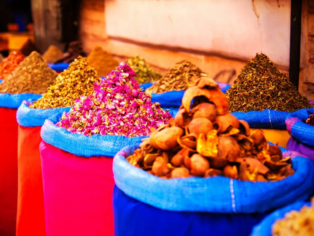 Colourful cones of spices at a market stall in Marrakech