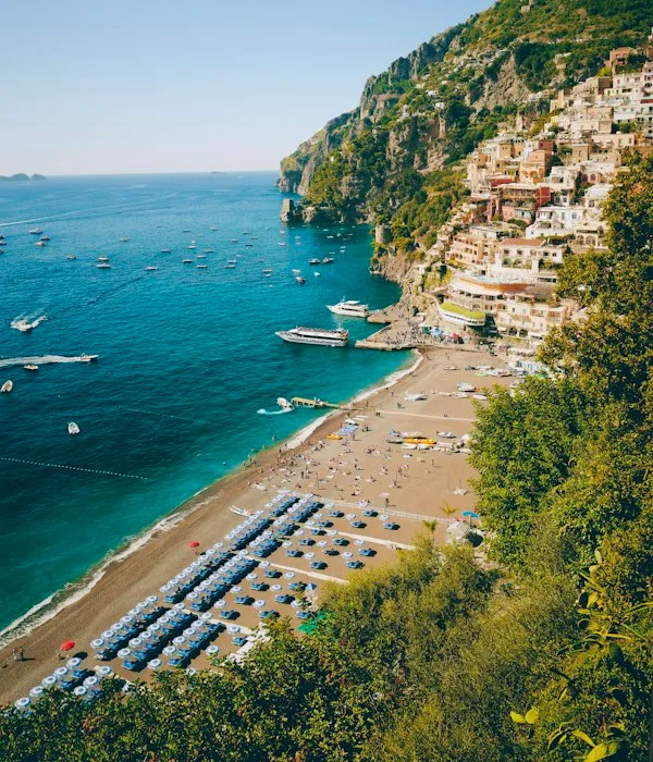 Boats in the bay below Positano on the Amalfi Coast
